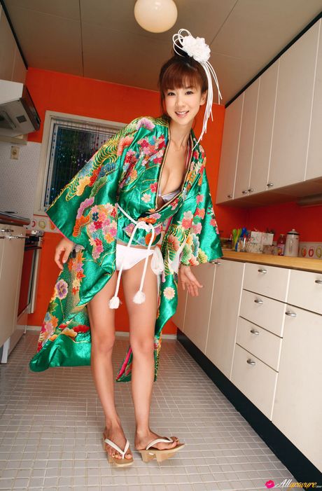 Hot Asian Babe Aki Hoshino Presents Her Big Tits And Poses In A Kimono