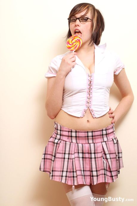 young busty: Nerdy british teen Louisa Lockhart strips to her heels and presents her amazing racks