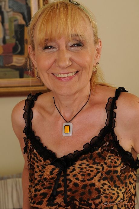 lusty grandmas: Mature hungarian blonde granny Nanney rides a young dick and gets facialized