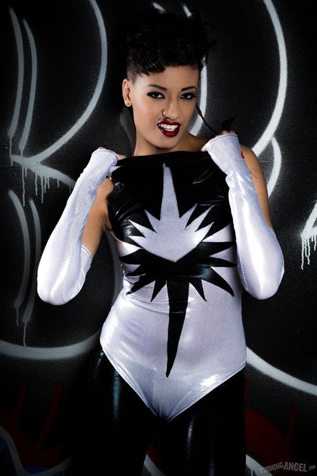 burning angel: Black haired babe R.E Zee Baby is a real super hero in her costume
