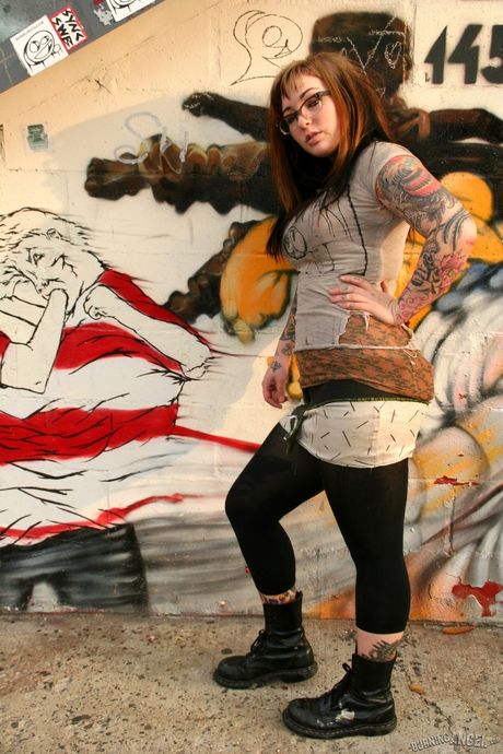 burning angel: Nerdy red-head Adahlia Cole demonstrates her huge tits and poses in a solo