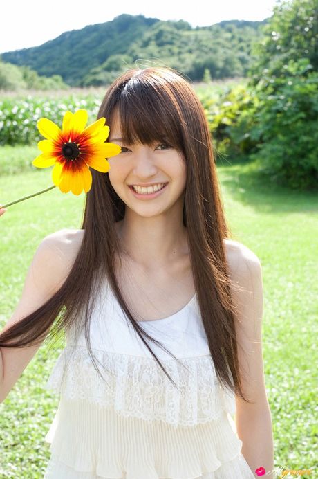 all gravure: Brown-eyed Japanese babe Rina Aizawa is posing outdoors in a solo