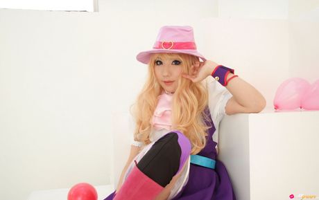 all gravure: Blonde japanese teen Saku models a hat and boots in a sexy manner