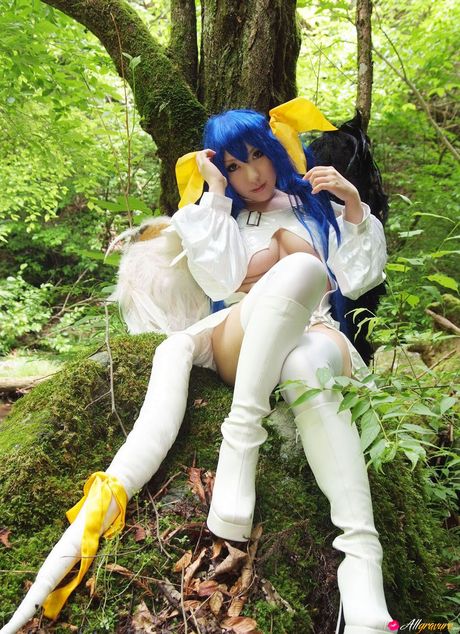 all gravure: Asian teen Ayaka models a long dress in a forest with blue hair