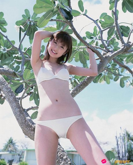 all gravure: Asian babe Yuko Ogura gets naked on a rocky shoreline
