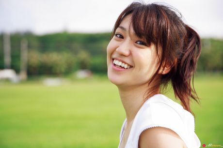 all gravure: Asian babe Yuko Oshima demonstrates her big racks and exhibits her perfect body in the field