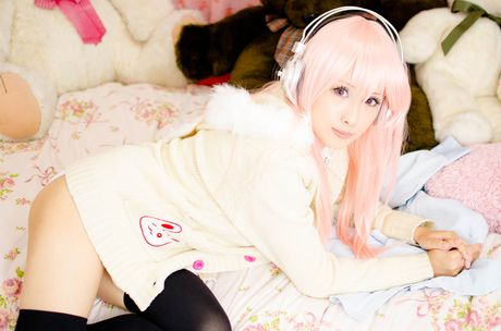 all gravure: Asian teen Smile Grateful sports pink hair while modelling in black stockings