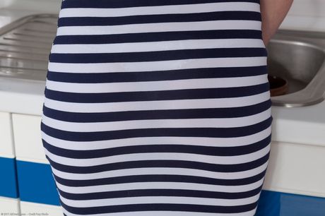 all over 30: Housewife Cherry Despina masturbates with a vibrator in the kitchen