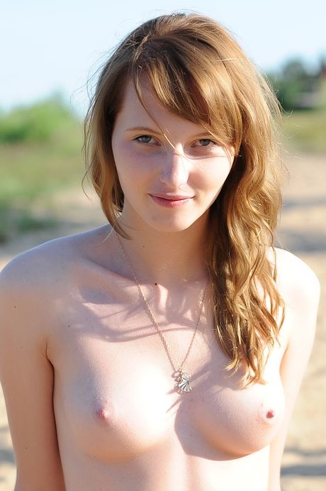 domai: Nice russian cutie Eriska A strips down on a rocky shoreline