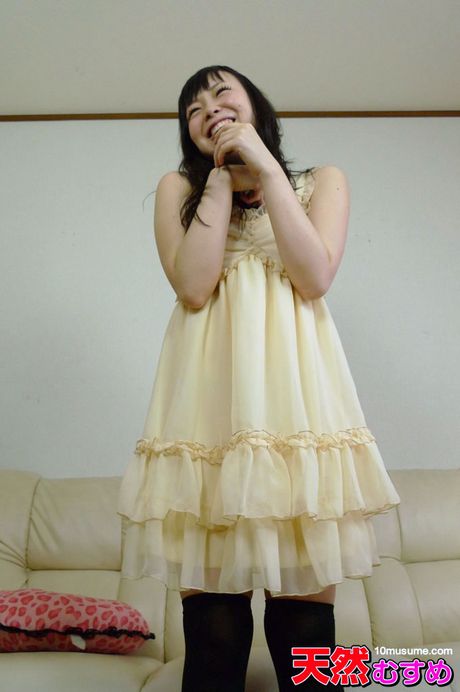 10musume: Asian stunner Yuri Sakurai gets naked before a POV fuck on a sofa