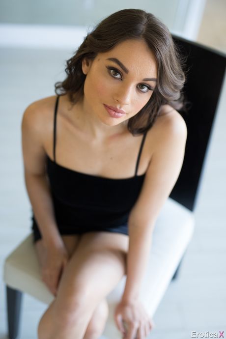 eroticax: The two of them get naked on the sofa and Liv Wild spreads her legs