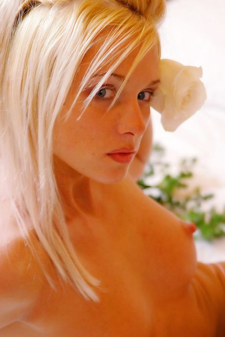 erotic beauty: Blonde ukrainian girl Yanina A takes off everything on a sofa boldly