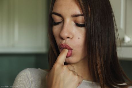 errotica archives: Svelte ukrainian babe Eos exposes her tiny tits and bald pussy in the kitchen