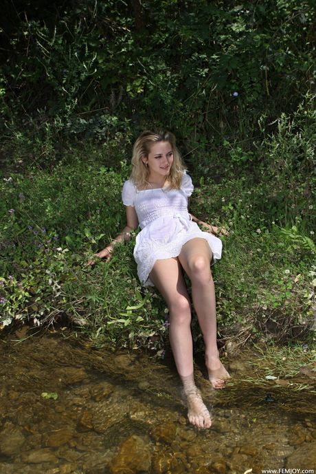 femjoy: Slim ukrainian beauty Niki Mey gets totally naked on a blanket in a forest