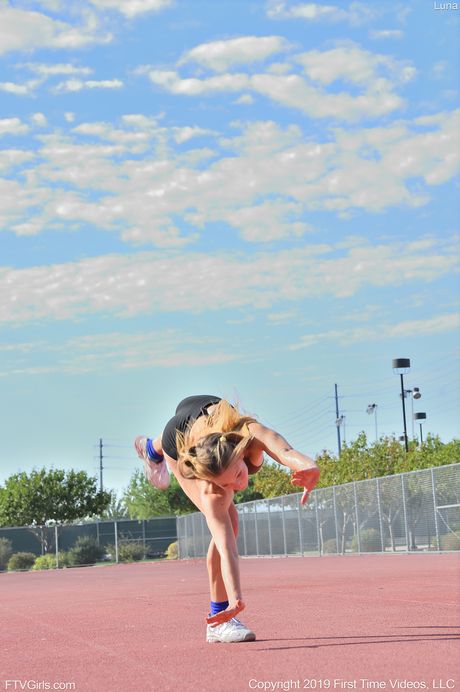 ftv girls: Lovely american teen Luna Light presents her hot ass and fingers wet pussy on the racetrack