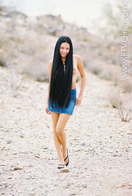 ftv girls: Dark haired teen Domino uncovers her small tits before getting naked