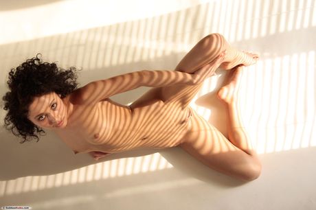 goddess nudes: Dark haired teen Gloria A exhibits her nice ass and twat in the nude