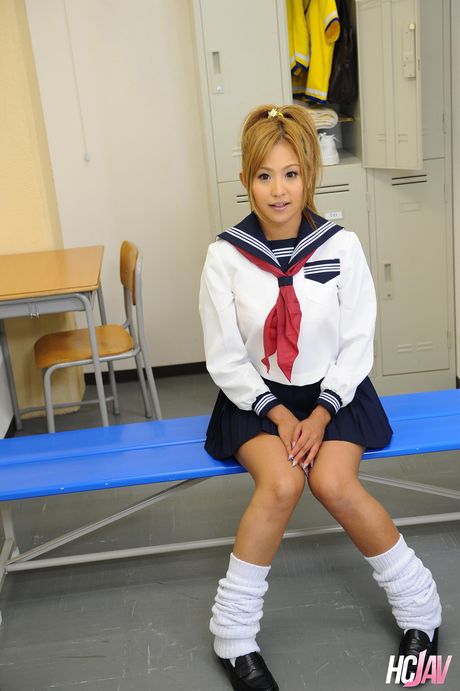 hcjav: Blonde japanese cheerleader Yui Aoyama gets naked on a bed in a pair of socks