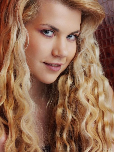 met art: Blonde russian covergirl Eveline A removes black panties to model totally naked