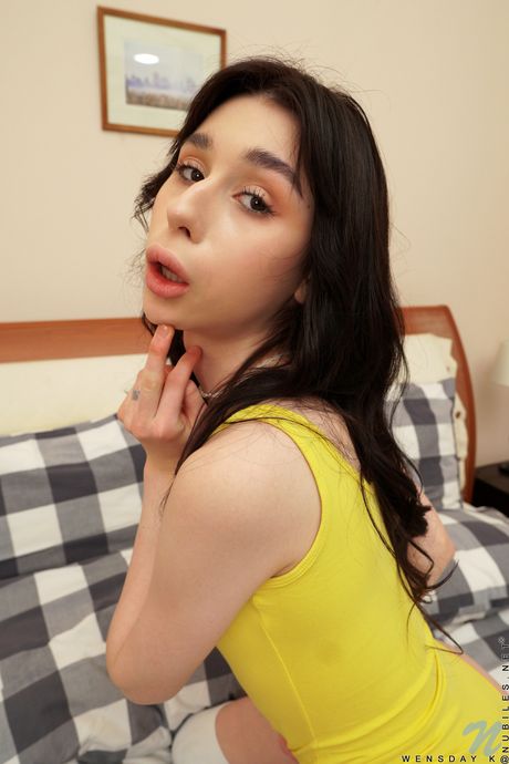 nubiles: First-Class russian girl Wensday K flaunts her tiny tits and her shaved pussy