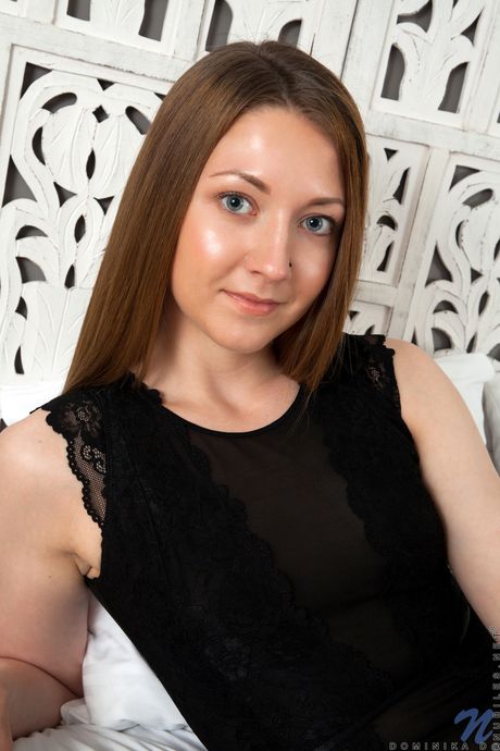 nubiles: Thin latvian teen Dominika D sports blue nails while getting totally naked