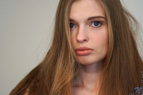 nubiles: Petite russian girl Adella takes off everything before finger fucking her pussy