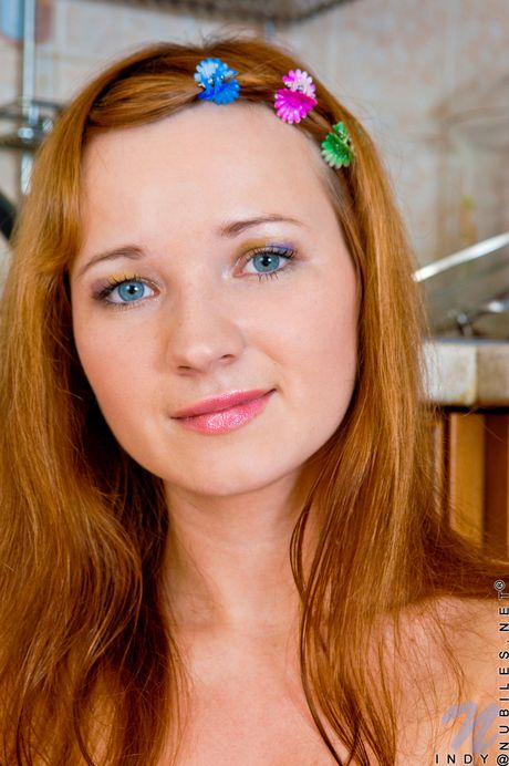 nubiles: Svelte russian girl Kate G rubs wet pussy in fishnet stockings