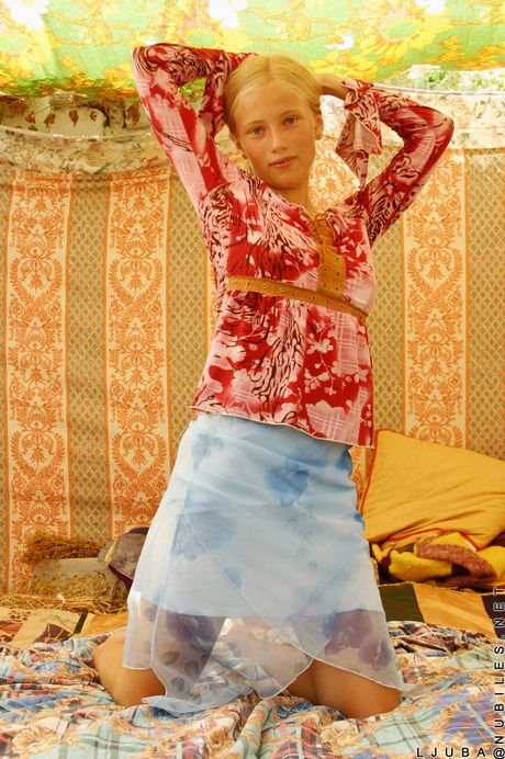 nubiles: Svelte russian stunner Ljuba demonstrates her pink pussy after getting totally naked