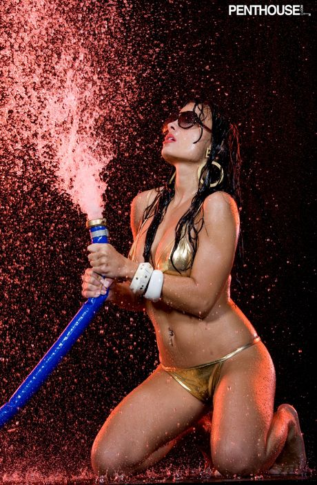 penthouse gold: Centerfold model Krista Ayne removes her sunglasses during a solo engagement