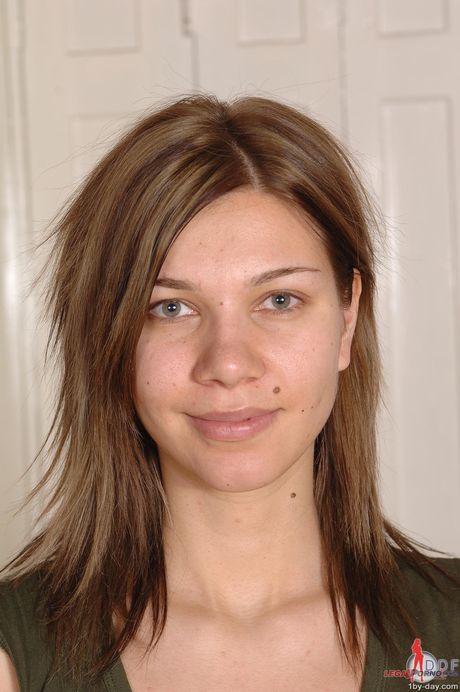 porn world: Cute hungarian teen girl Goldy reveals her nice ass and shaved pussy in the kitchen