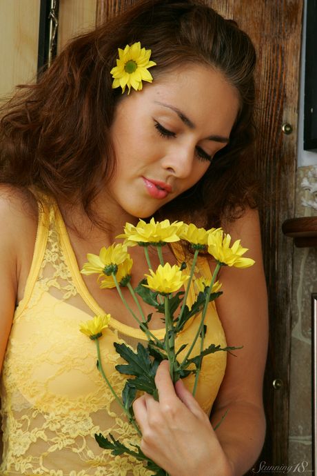 stunning 18: 18-Year-Old ukrainian stunner Olga G removes all clothes on a blanket in a field