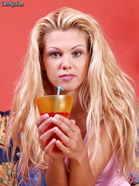 twistys: Alluring hungarian blond Grety removes her jeans and panties before masturbating