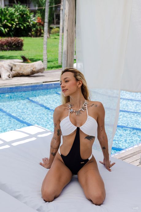 watch 4 beauty: Lean venezuelan girl Camila Luna gets naked on a poolside patio in a sexy manner